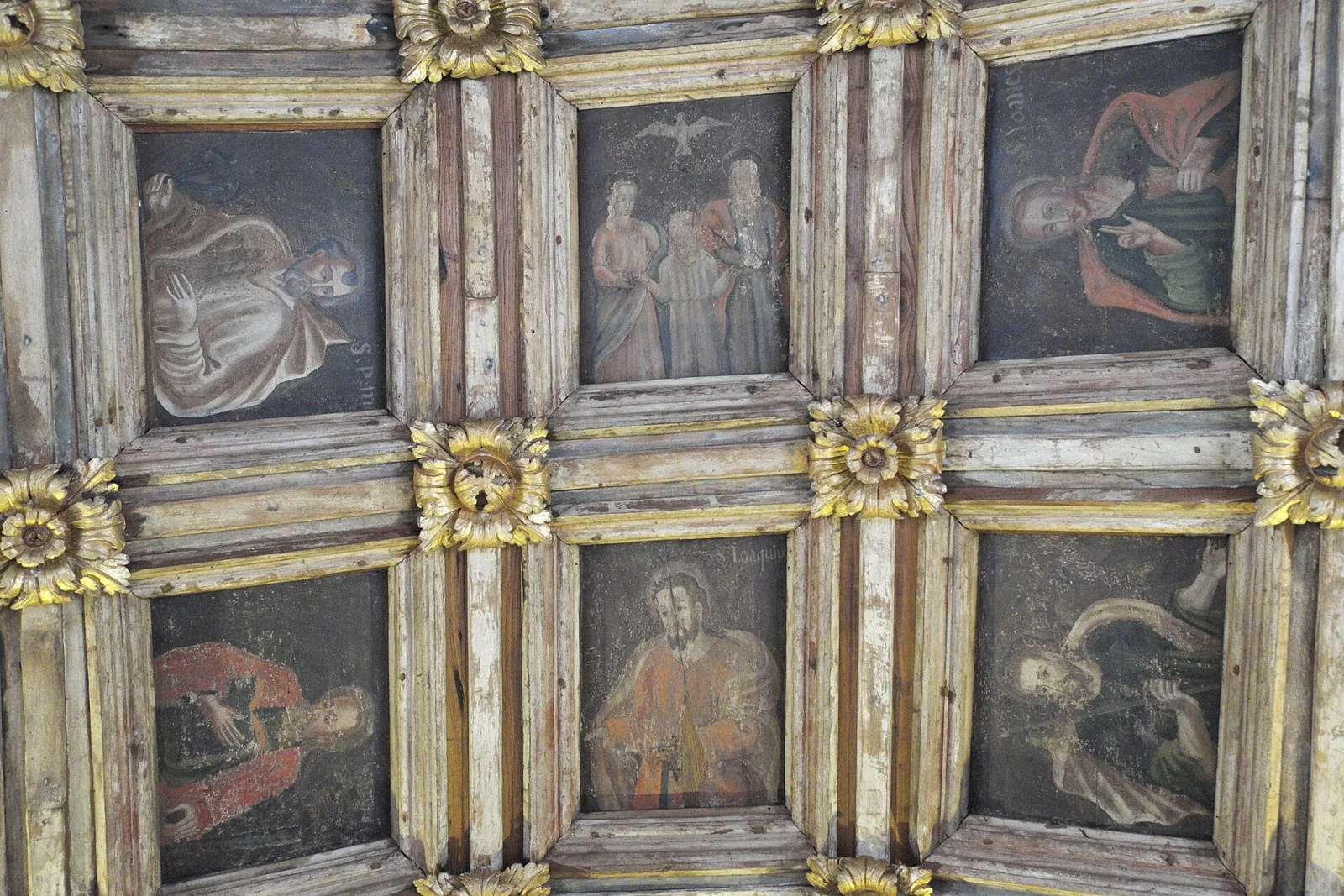 The chapel's painted coffered ceiling